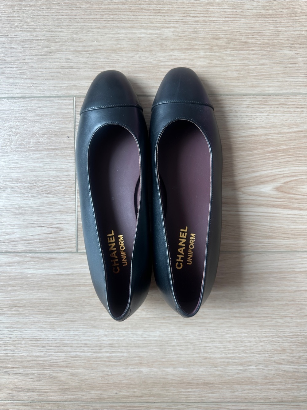 CHANEL Black Leather Cap-Toe Flats